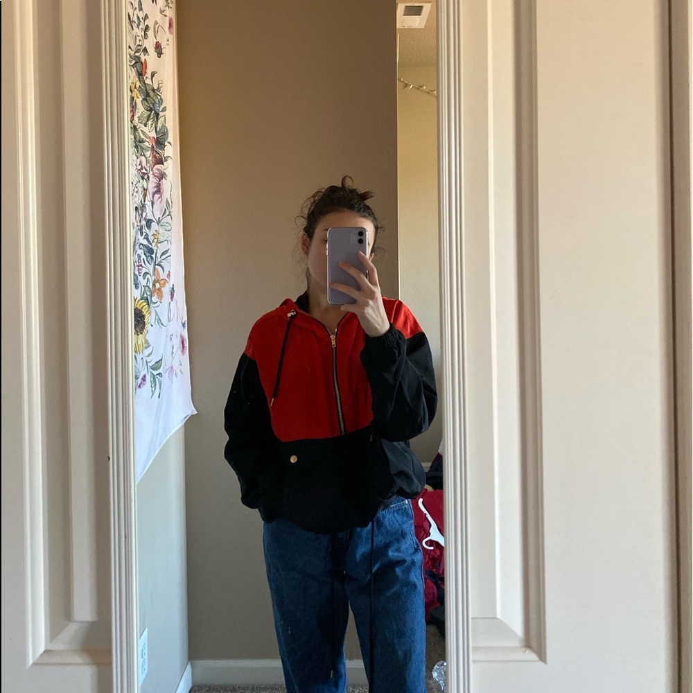 red & black half zip windbreaker
